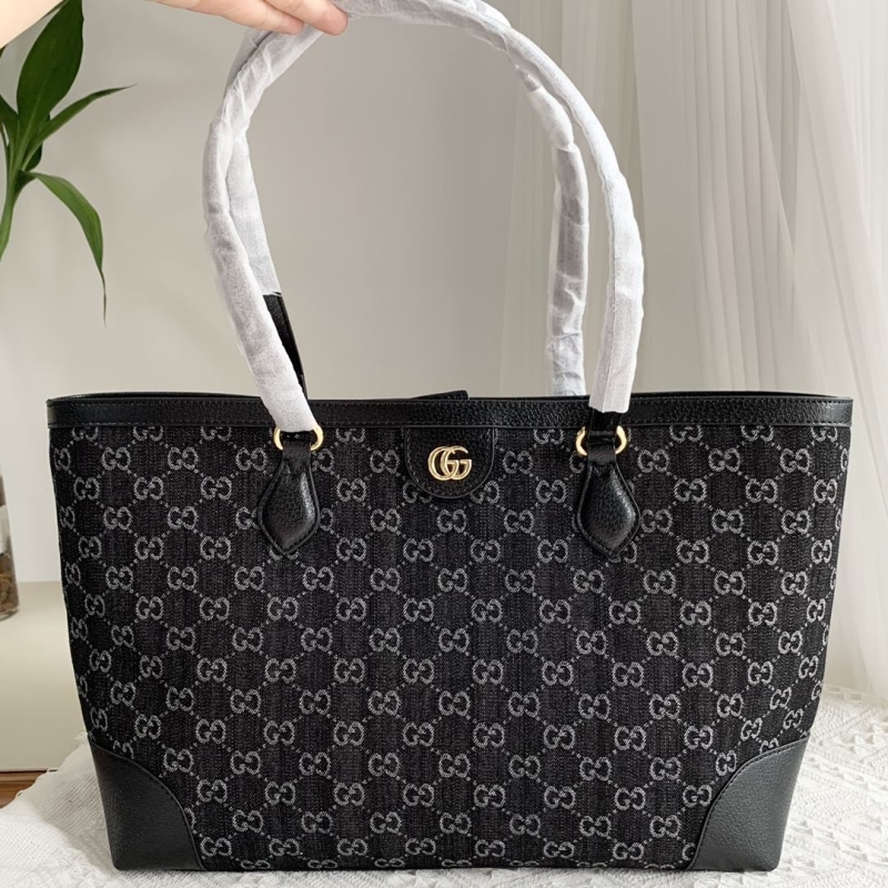 G*u*i shopping bags